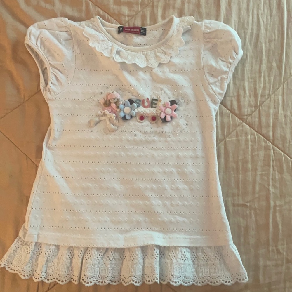 girl’s white dress (name brand: Two Sisters)